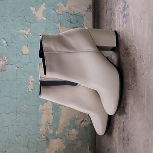 Rizzoli cream leather heeled boots